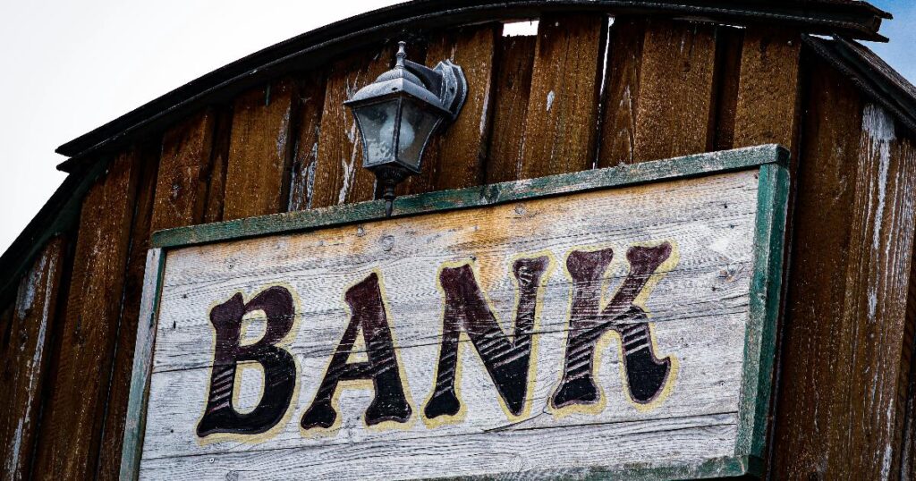Corporate borrowers and bank loan documents illustrating the bank capital effect on business lending costs