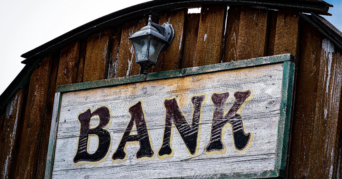 Corporate borrowers and bank loan documents illustrating the bank capital effect on business lending costs